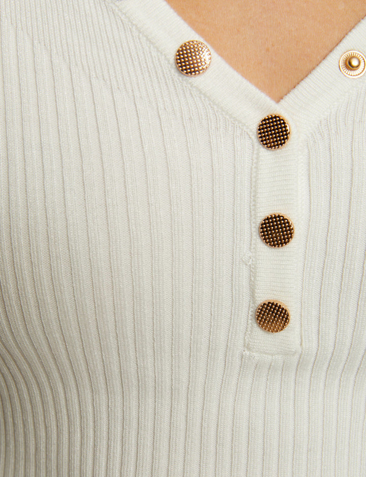 Pull manches longues avec boutons