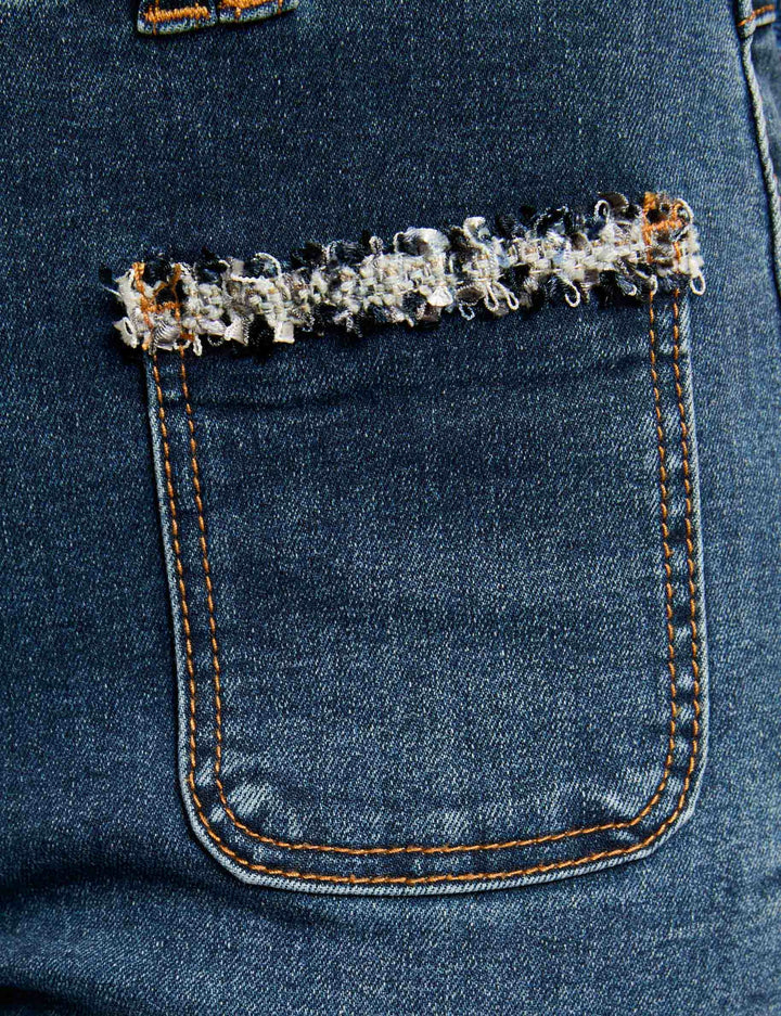 Jeans bootcut détails franges