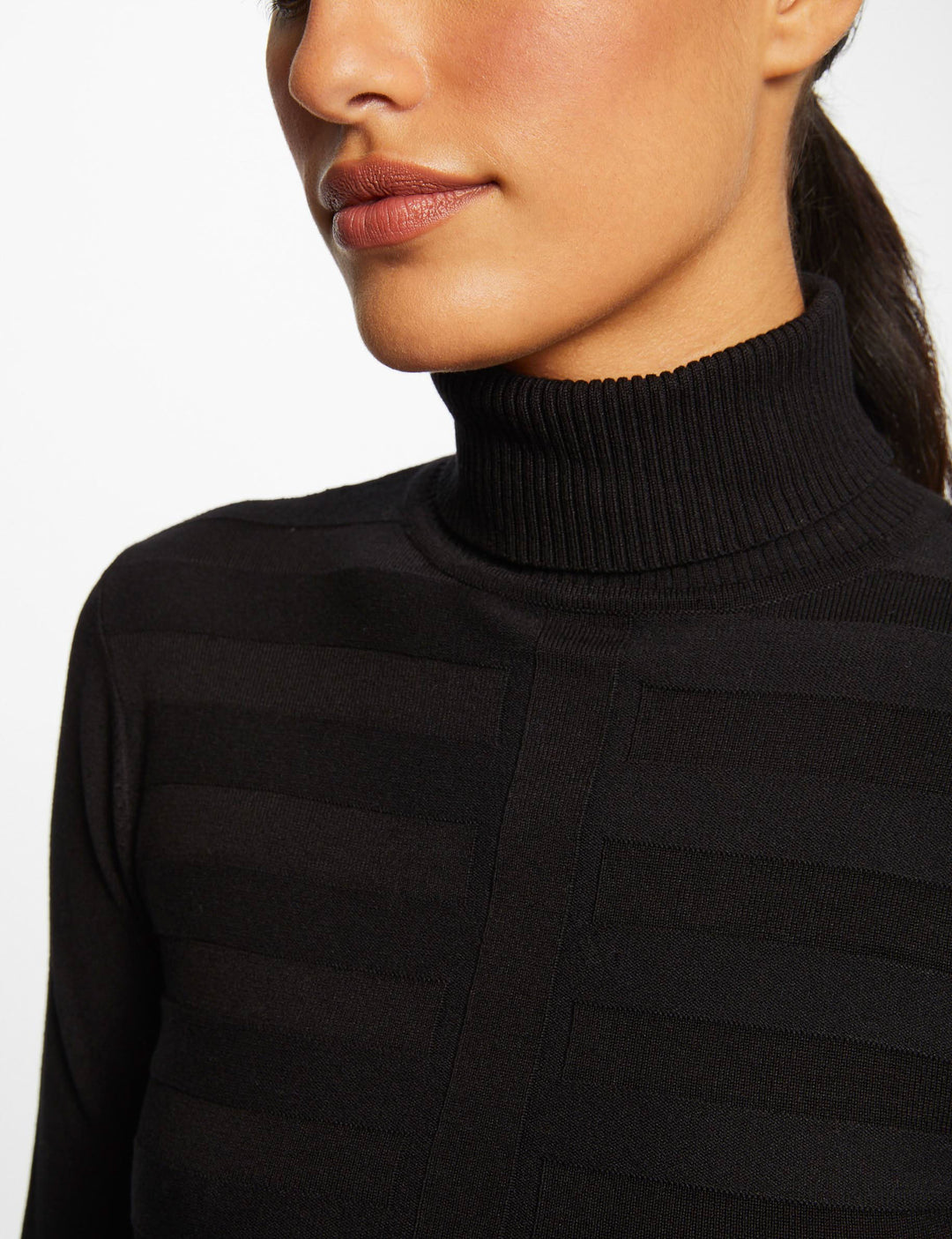 Pull col roulé ajusté