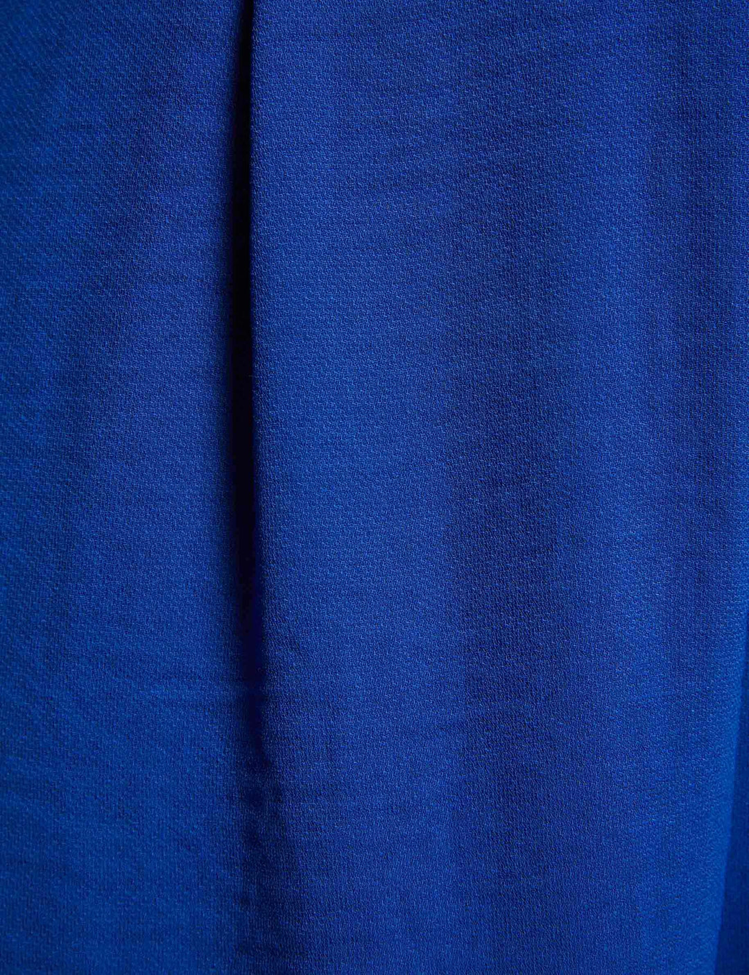 Combinaison jambe large détail boucle