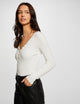 Pull manches longues avec boutons