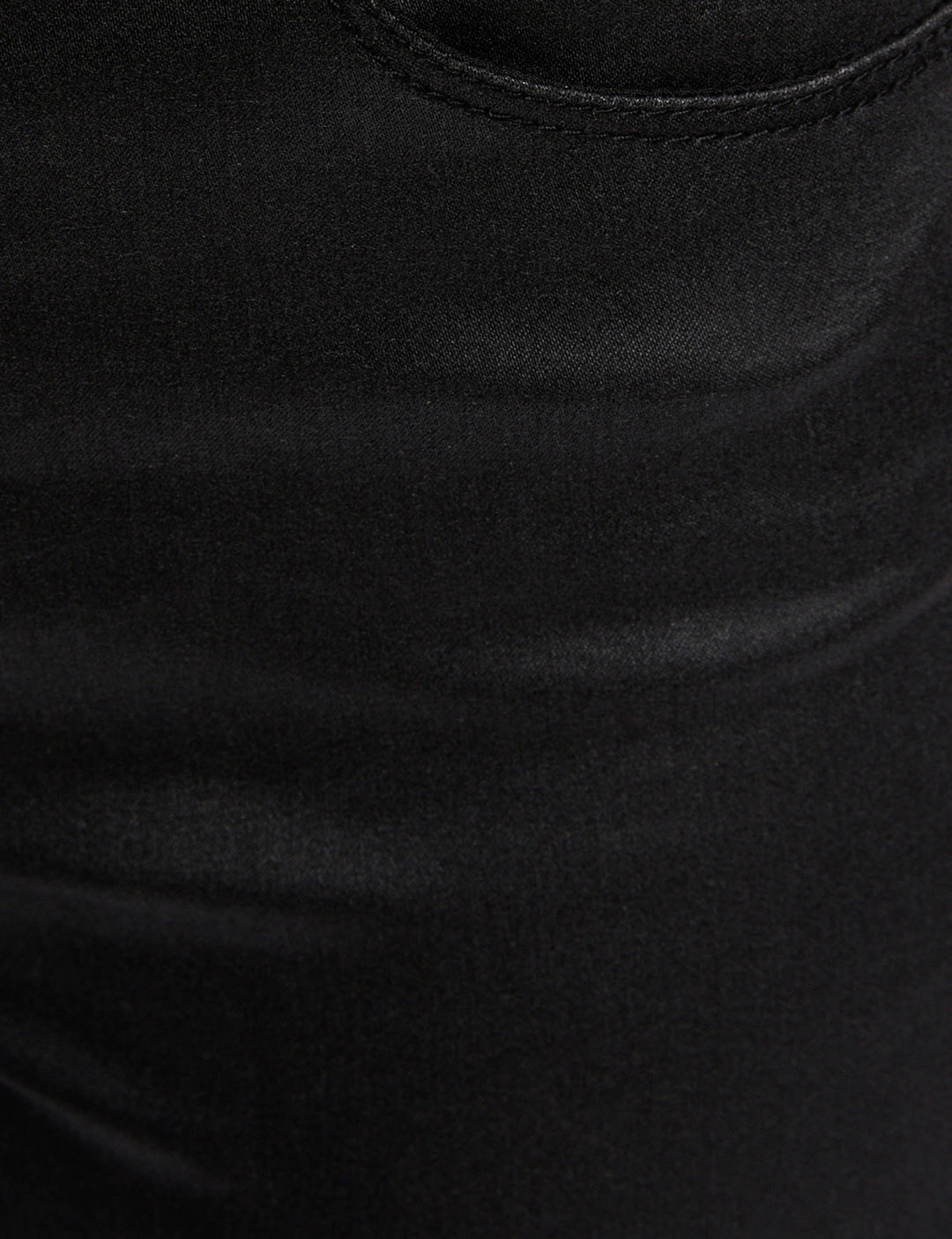 Pantalon slim enduit avec clous