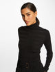 Pull col roulé ajusté