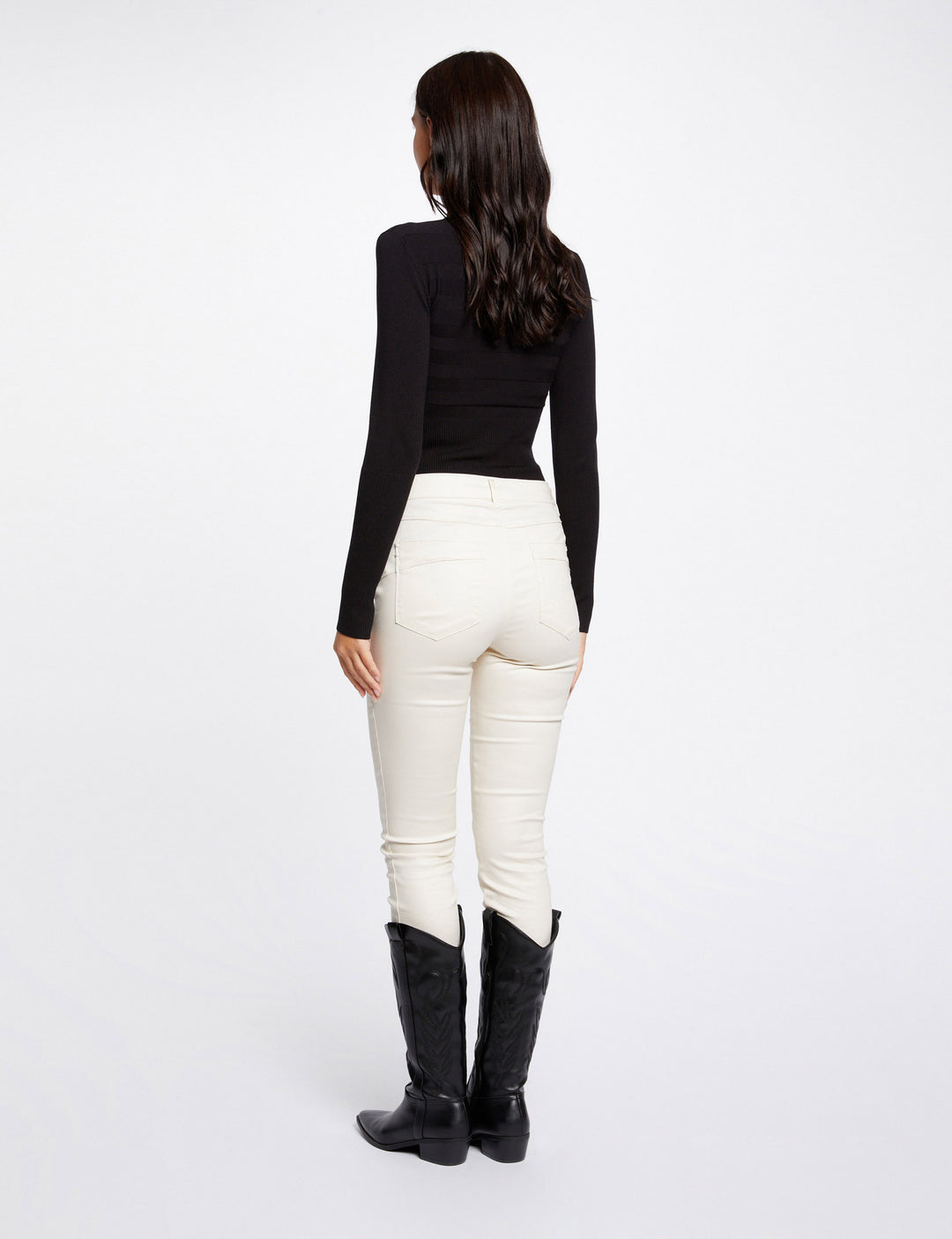 Pantalon slim enduit avec clous