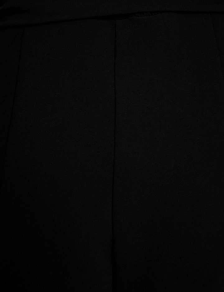 Combinaison jambes larges ceinturée