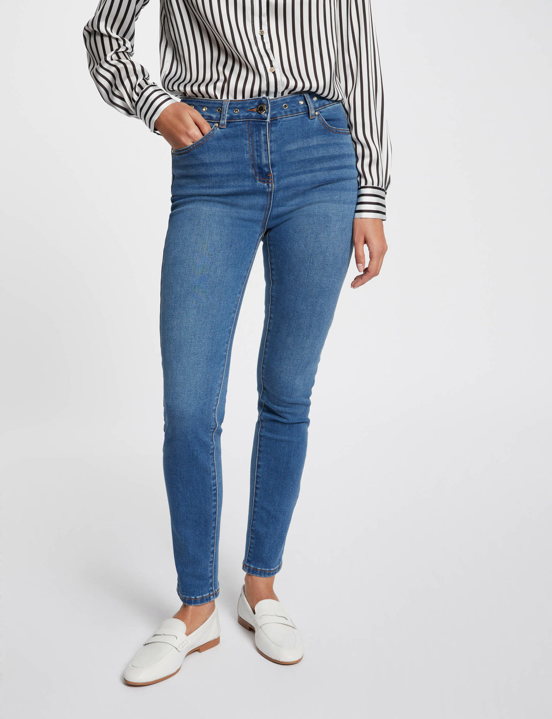 Jeans slim détails oeillets
