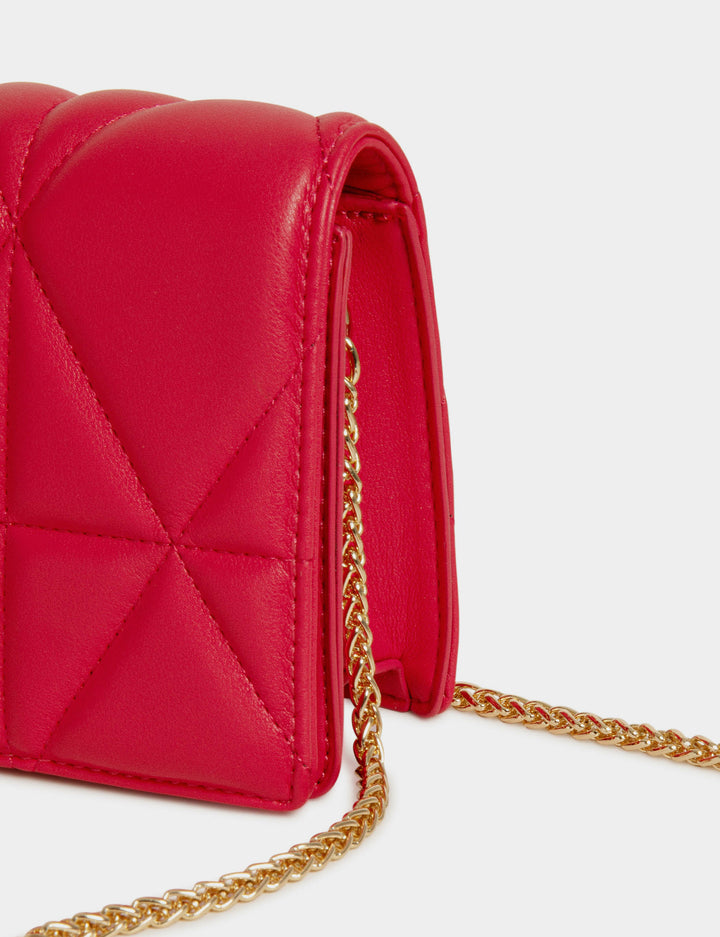 Sac pochette matelassé en bandoulière