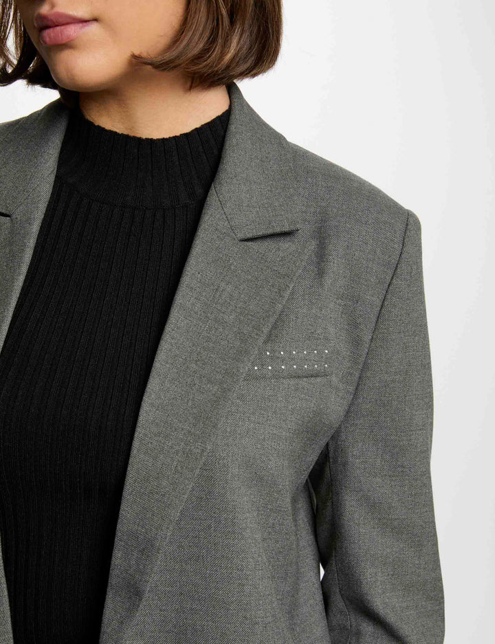 Veste longue détails cloutés