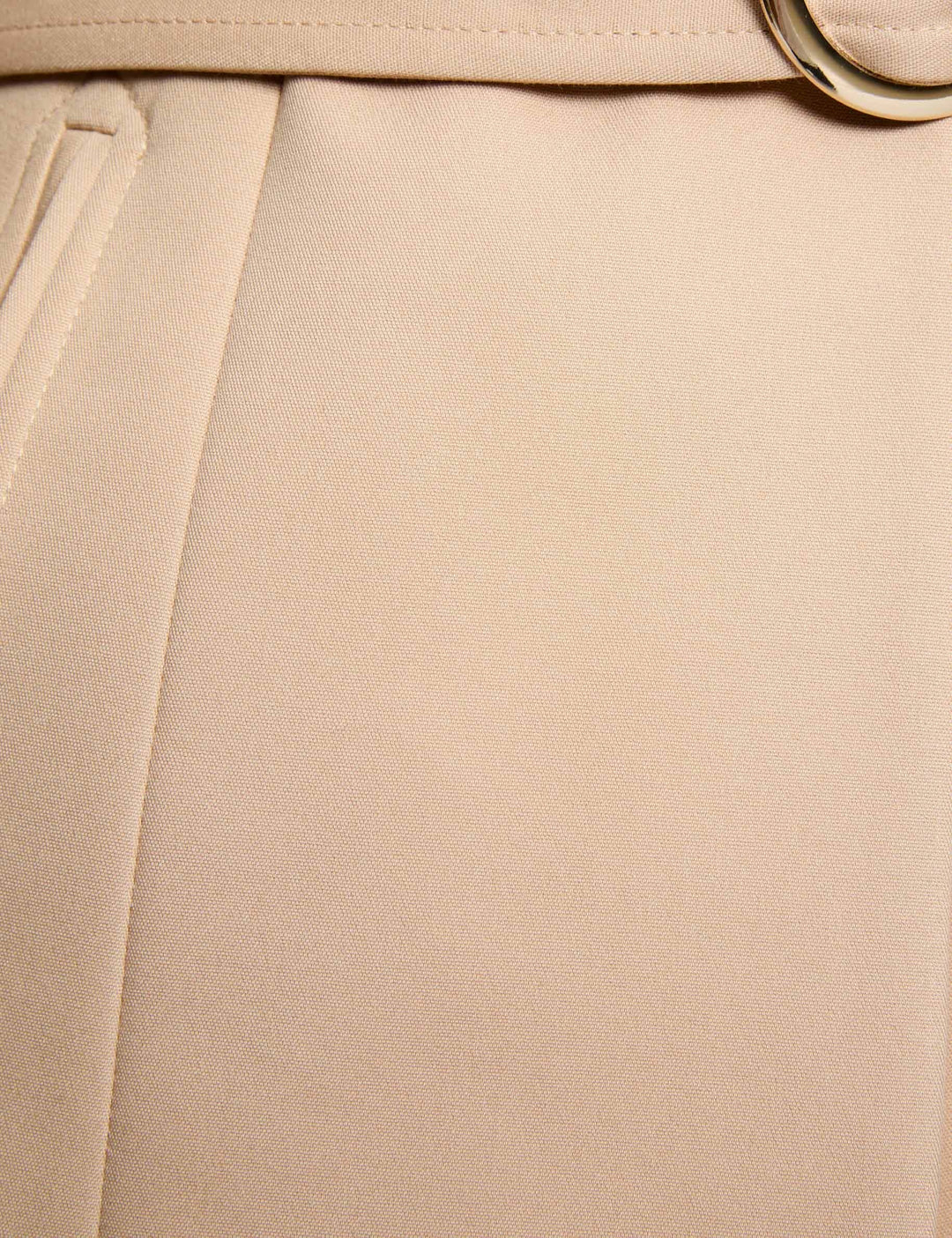 Veste droite sans manches ceinturée