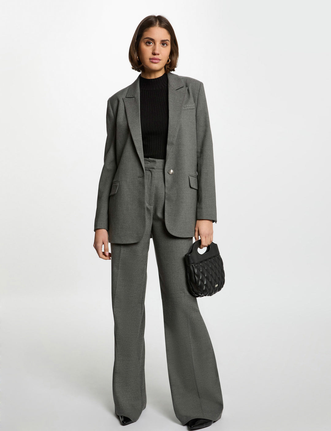 Veste longue détails cloutés