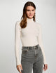 Pull col roulé ajusté
