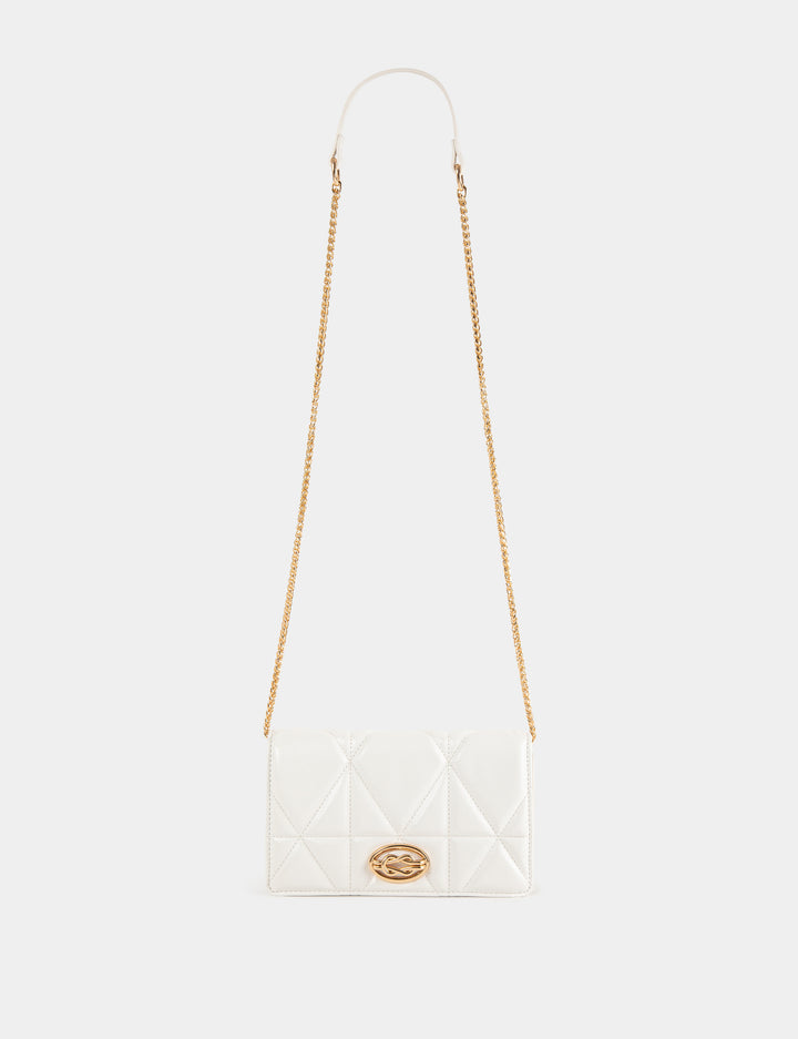 Sac pochette matelassé en bandoulière