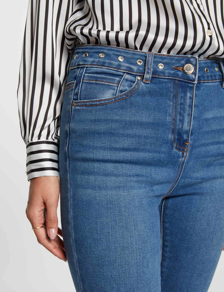 Jeans slim détails oeillets